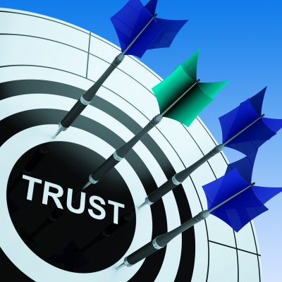 Trust Dart board with arrows